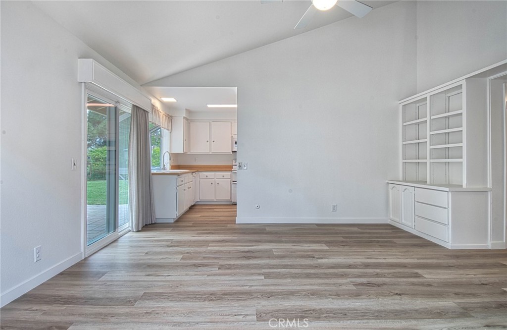 6061 Sierra Bravo Road Irvine, CA 92603 - Photo 13 of 22 a view of an empty room with a window and wooden floor