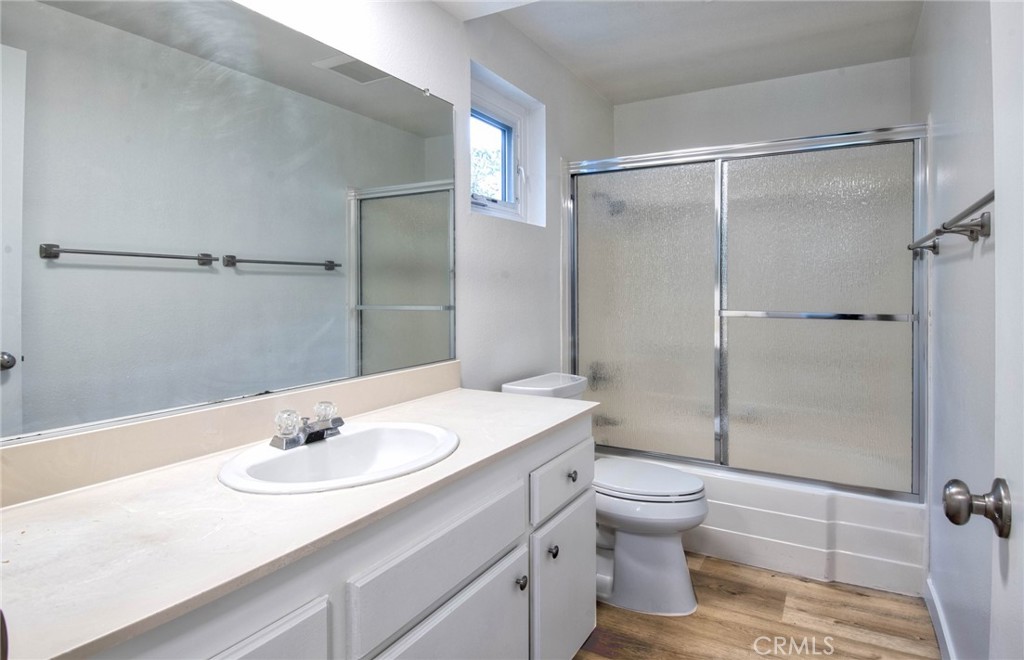 6061 Sierra Bravo Road Irvine, CA 92603 - Photo 15 of 22 a bathroom with a sink toilet and shower