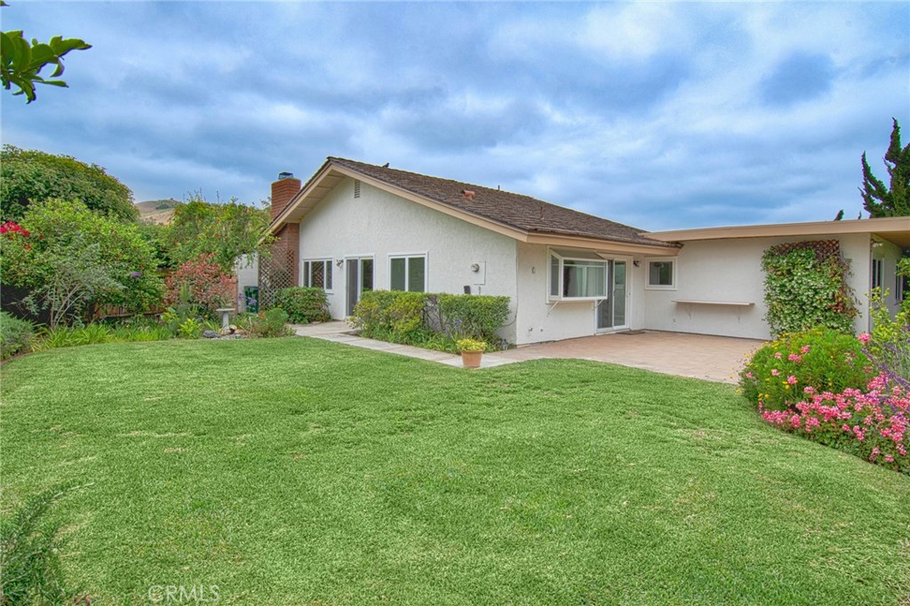6061 Sierra Bravo Road Irvine, CA 92603 - Photo 2 of 22 a view of outdoor space yard and front view of house