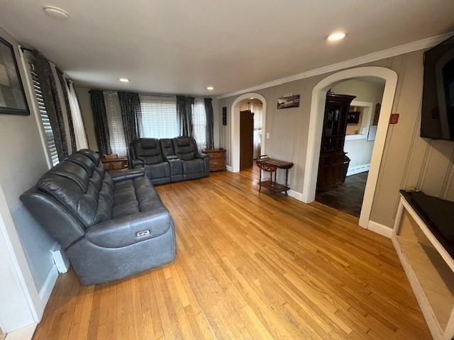 4 Summit Street Waltham, MA 02451 - Photo 7 of 22 a living room with furniture and a wooden floor
