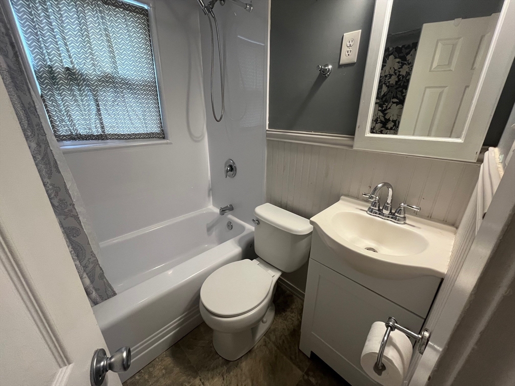 4 Summit Street Waltham, MA 02451 - Photo 9 of 22 a bathroom with a sink toilet and shower