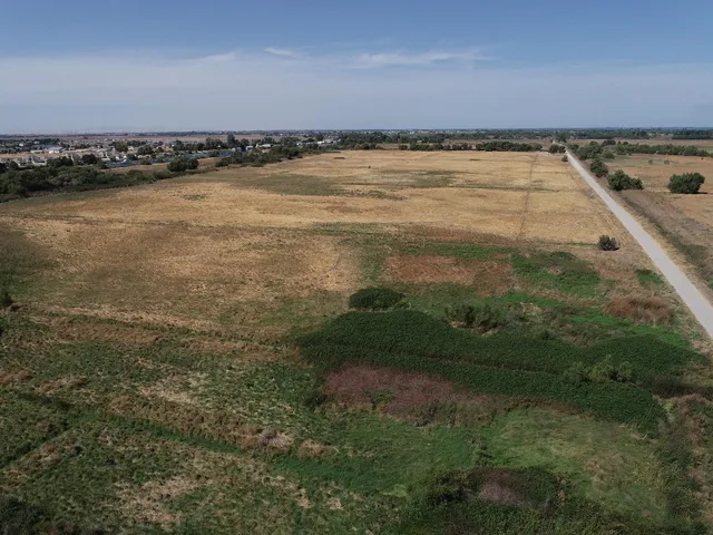 a view of an ocean and mountain