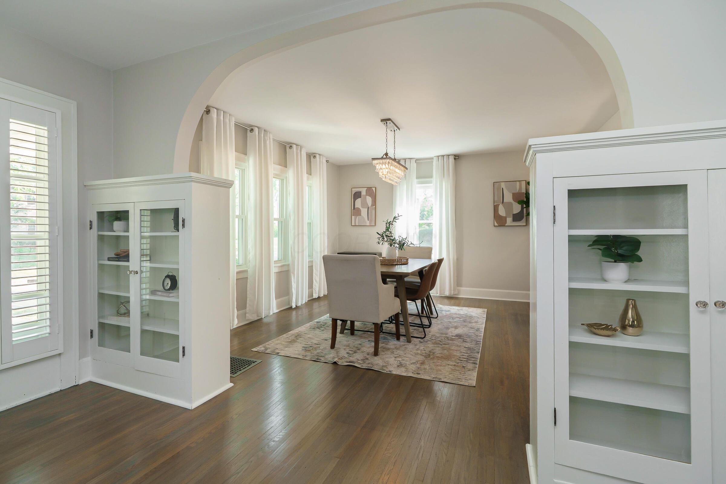 163 Garden Road Columbus, OH 43214 - Photo 11 of 46 Stunning architectural details have been well preserved and enhanced in this updated home including the large archways and built-ins.