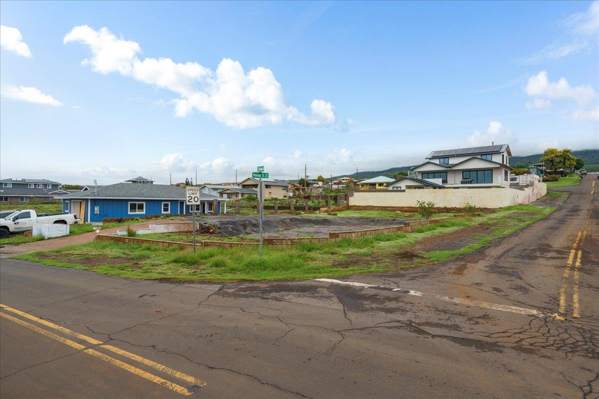 1560 Ainakea Road Lahaina, HI 96761 - Photo 14 of 25 a view of a big house with a big yard and large trees