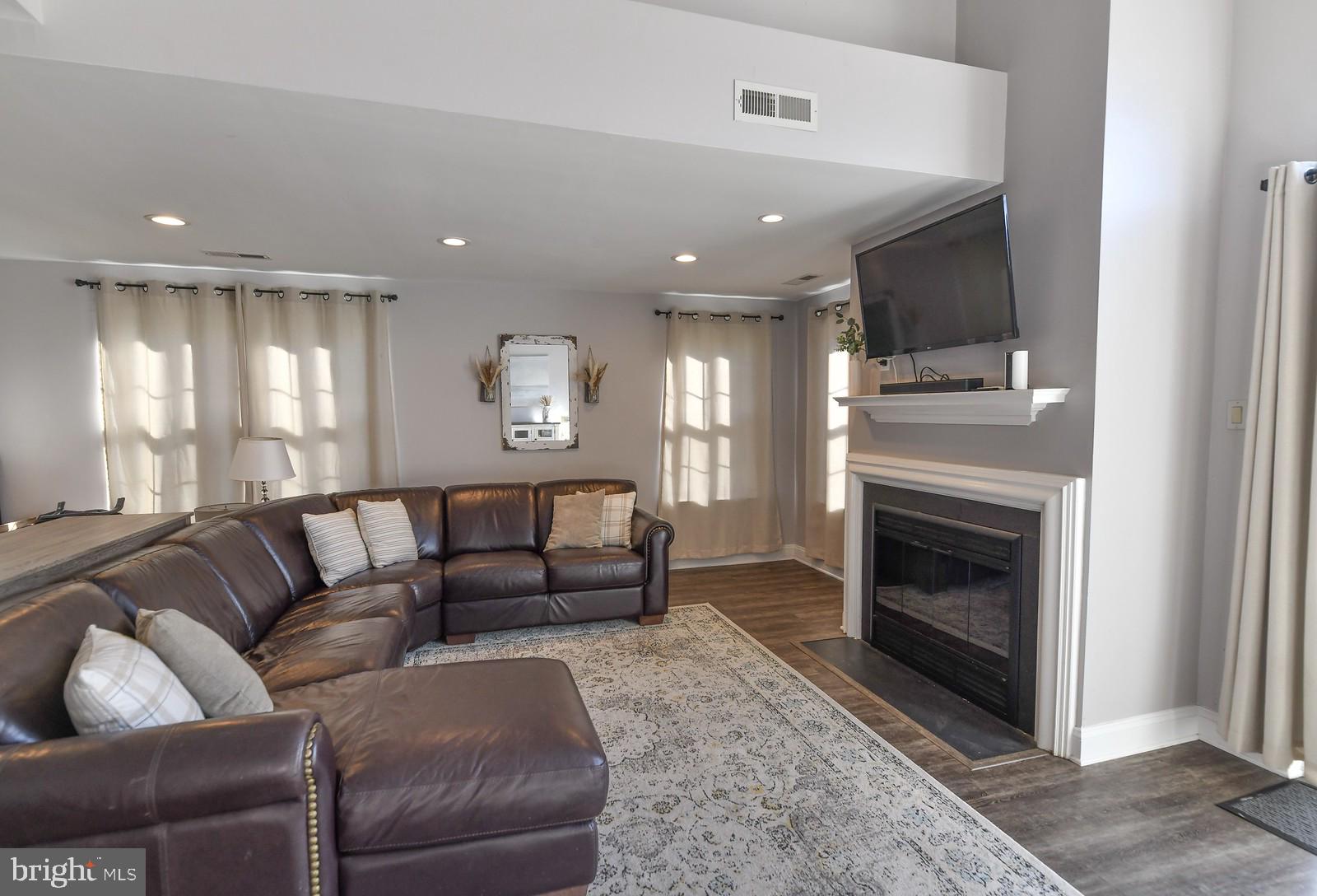 21 East Park Road Newtown, PA 18940 - Photo 9 of 25 Wood burning fireplace with custom doors