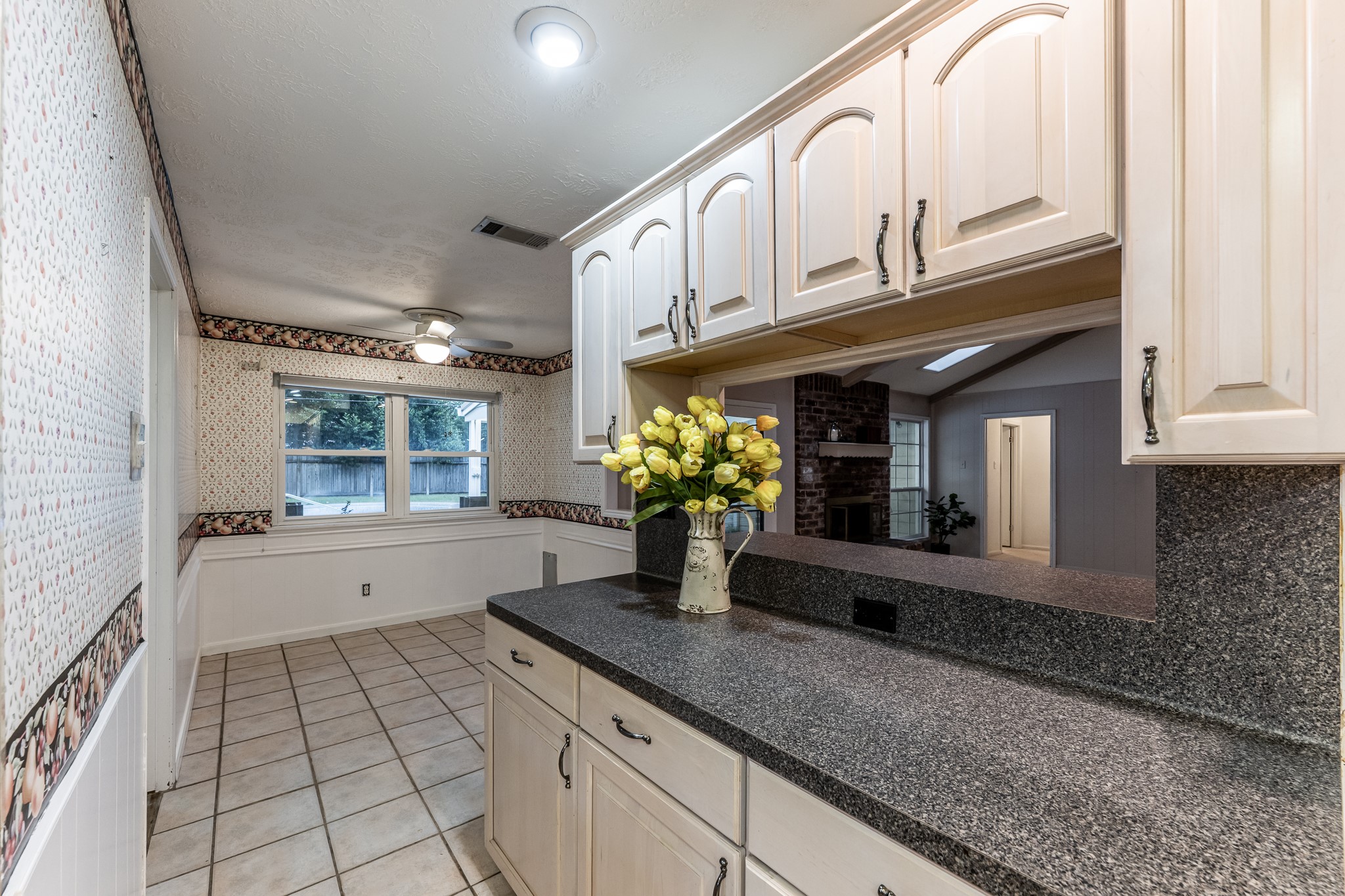 206 Hickory Ridge Drive Shenandoah, TX 77381 - Photo 12 of 35 a kitchen with stainless steel appliances granite countertop a sink and cabinets