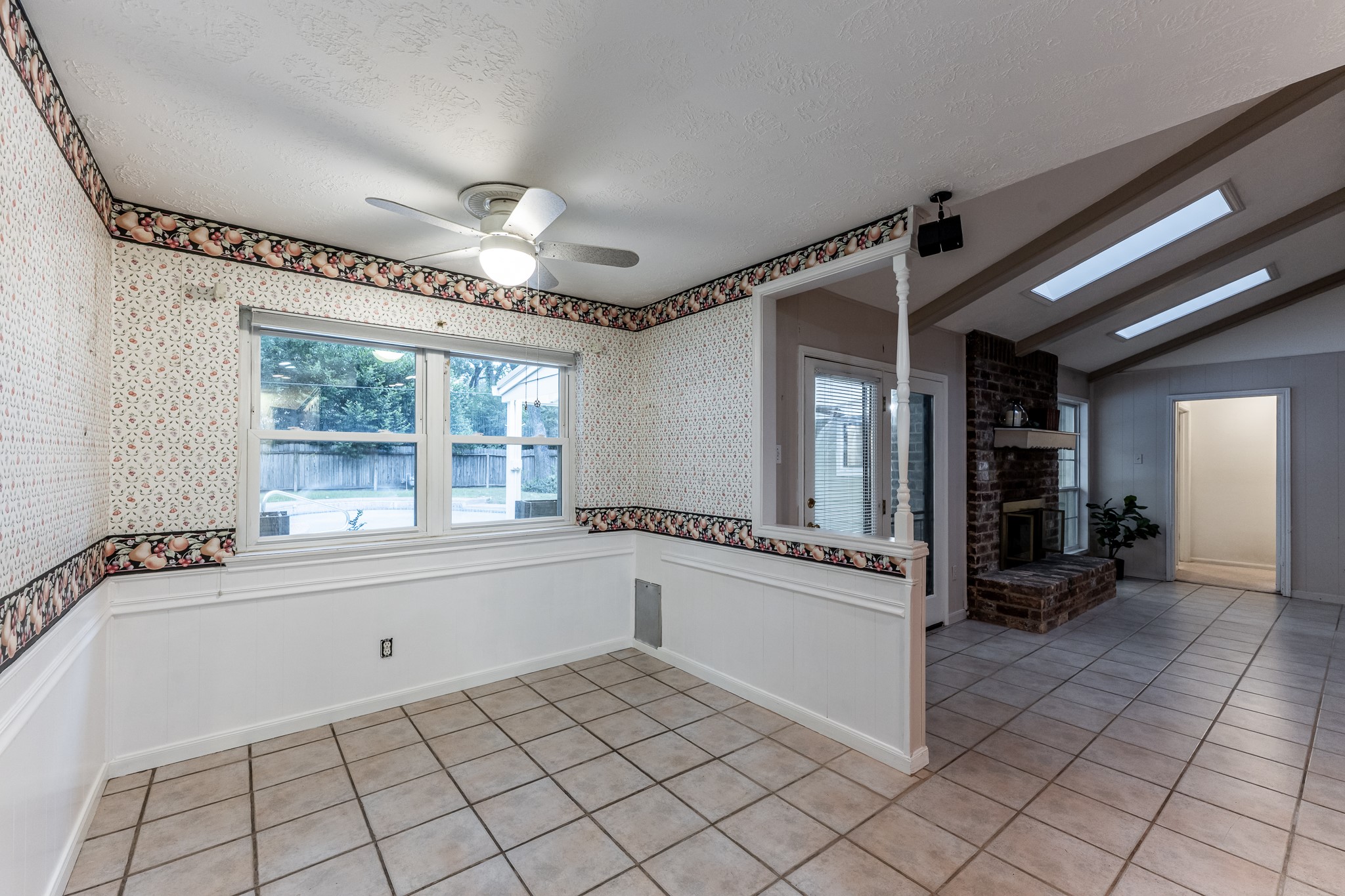 206 Hickory Ridge Drive Shenandoah, TX 77381 - Photo 13 of 35 a bathroom with a tub a sink and a large mirror next to a window
