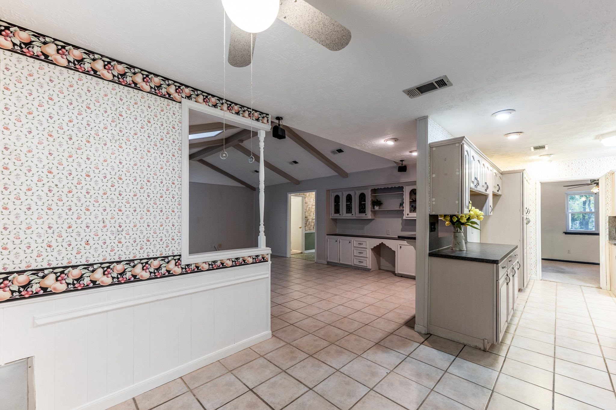 206 Hickory Ridge Drive Shenandoah, TX 77381 - Photo 14 of 35 a view of a kitchen with microwave and cabinets