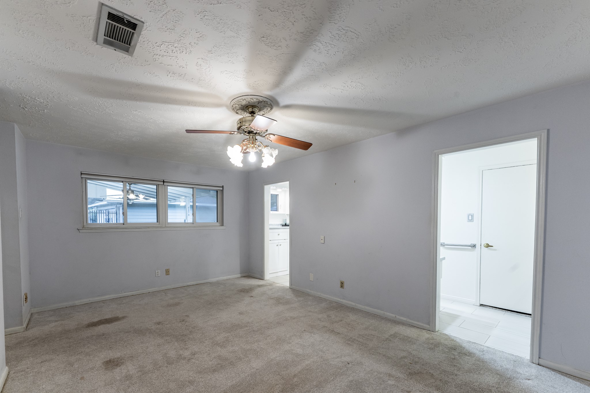 206 Hickory Ridge Drive Shenandoah, TX 77381 - Photo 20 of 35 a view of a chandelier in a room