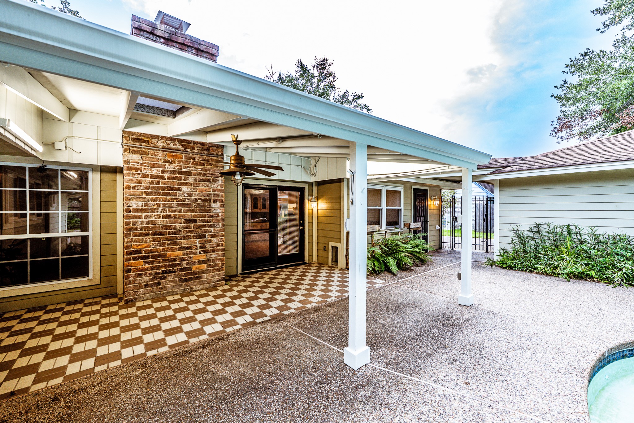 206 Hickory Ridge Drive Shenandoah, TX 77381 - Photo 32 of 35 a view of a brick house with a large window