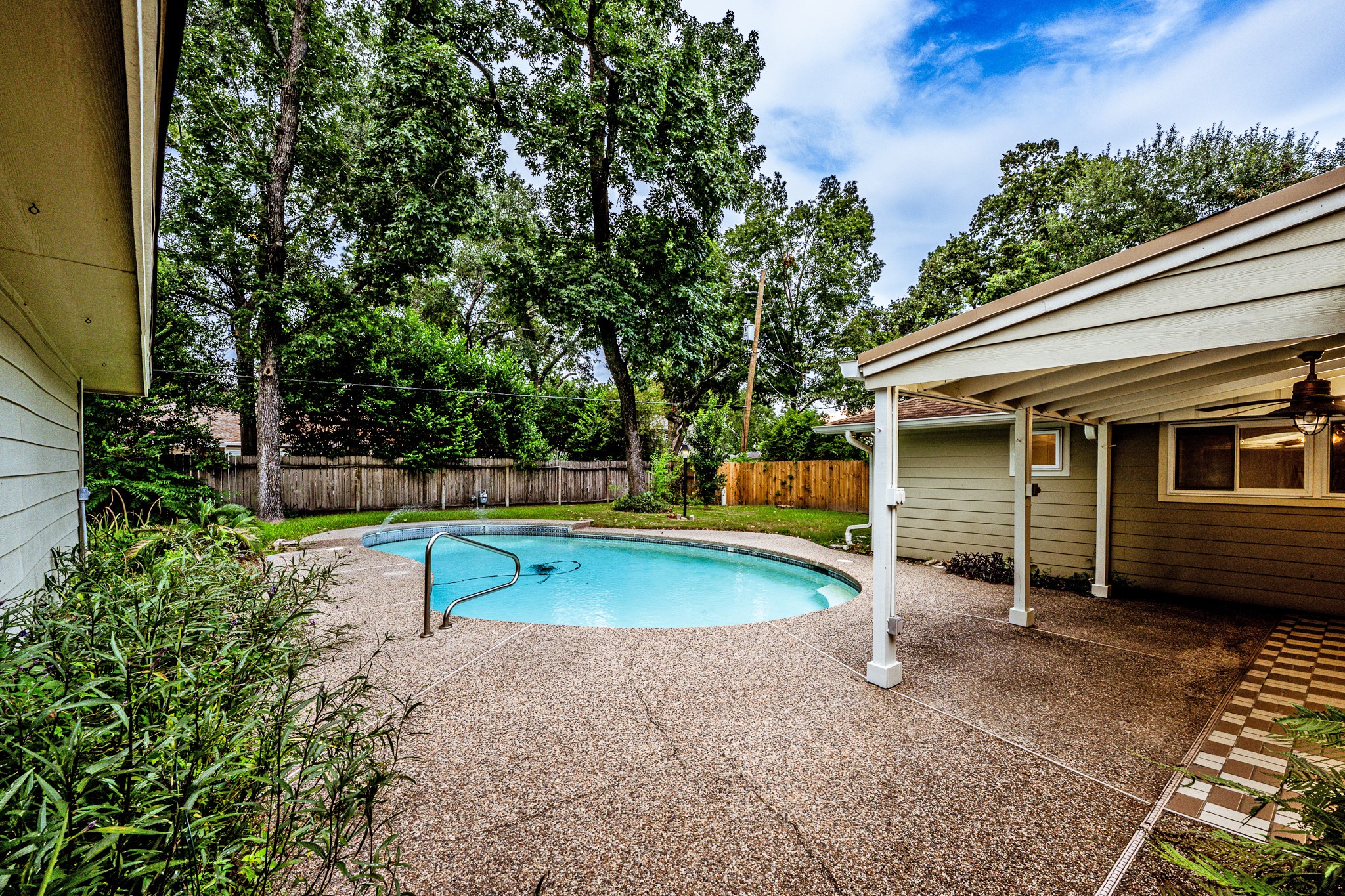 206 Hickory Ridge Drive Shenandoah, TX 77381 - Photo 33 of 35 a view of a house with a backyard