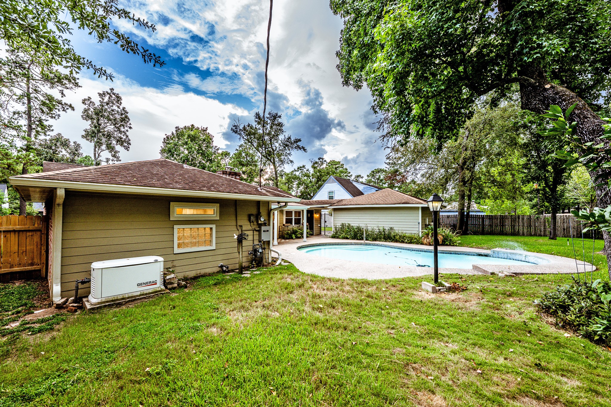 206 Hickory Ridge Drive Shenandoah, TX 77381 - Photo 35 of 35 a front view of a house with a yard