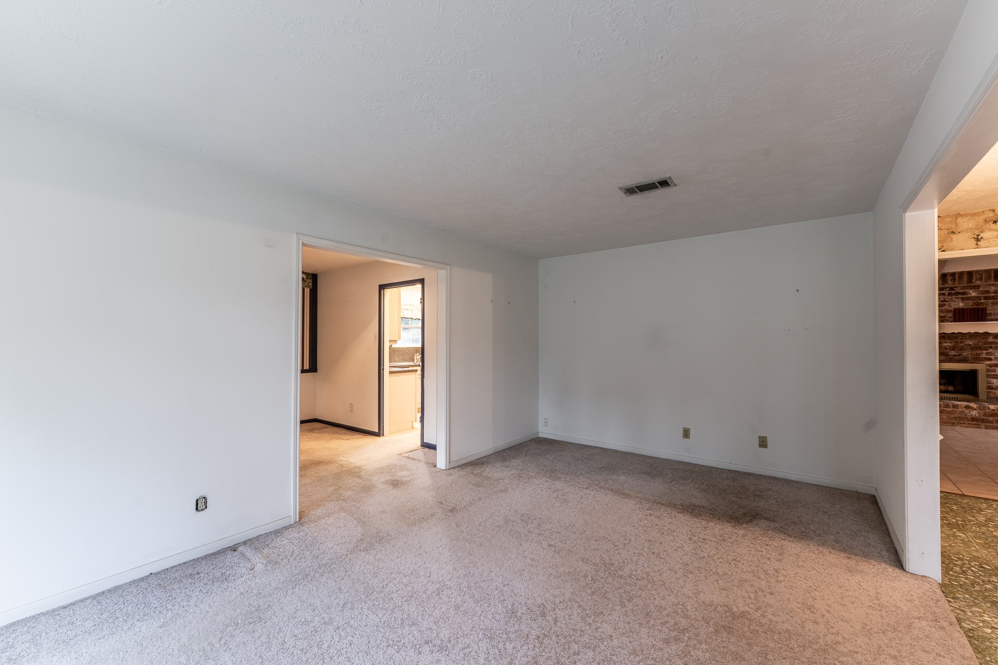 206 Hickory Ridge Drive Shenandoah, TX 77381 - Photo 7 of 35 a view of an empty room with a window
