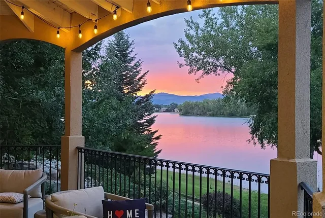a spacious bathroom with a double vanity sink a mirror and a bathtub