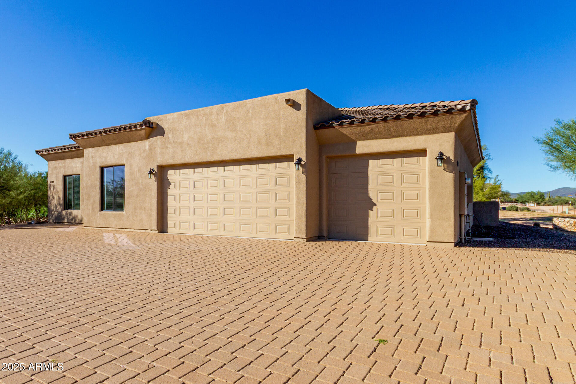16738 East Lone Mountain Road Scottsdale, AZ 85262 - Photo 12 of 88 a view of a house with a wooden bench