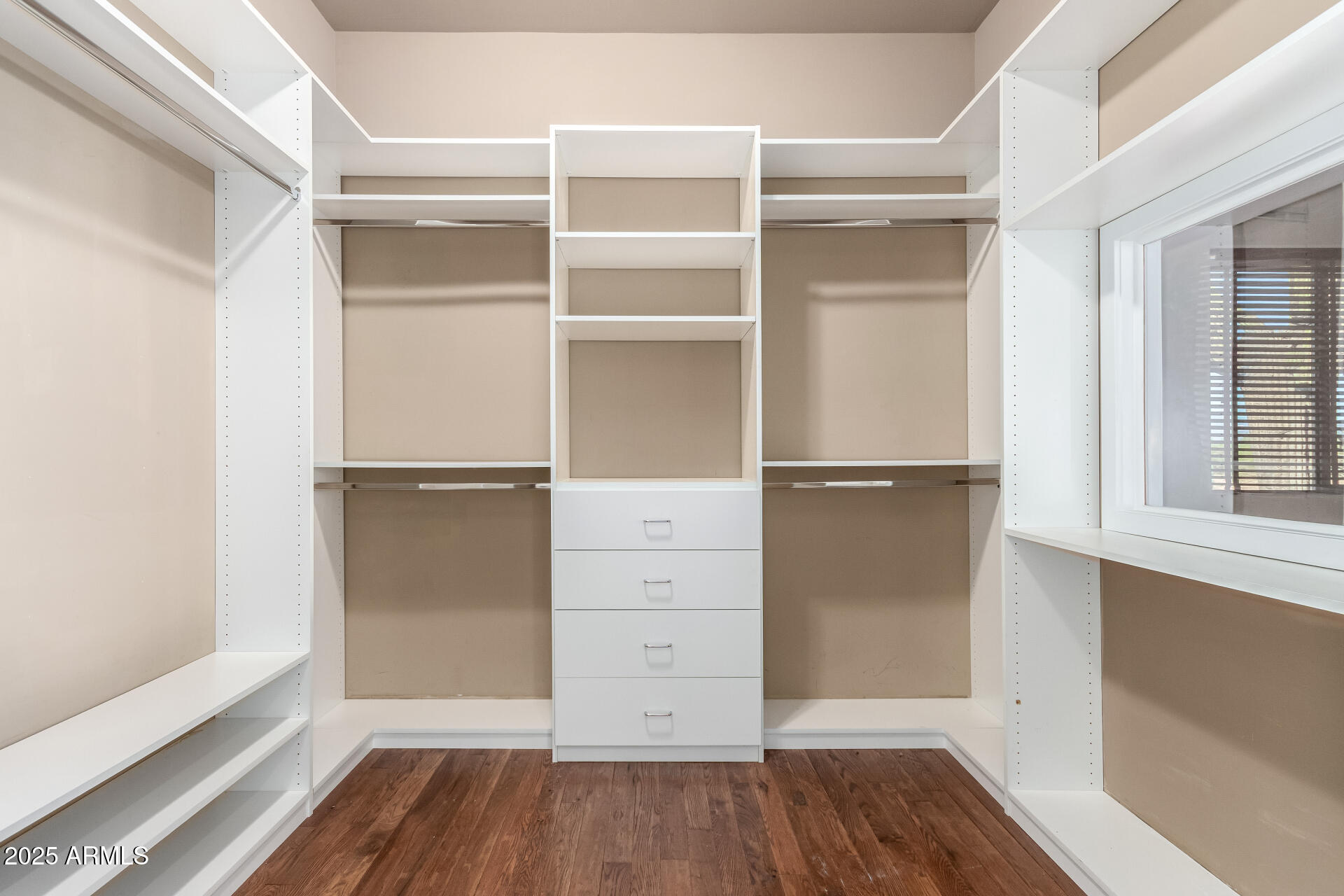 16738 East Lone Mountain Road Scottsdale, AZ 85262 - Photo 42 of 88 a view of walk in closet with empty racks