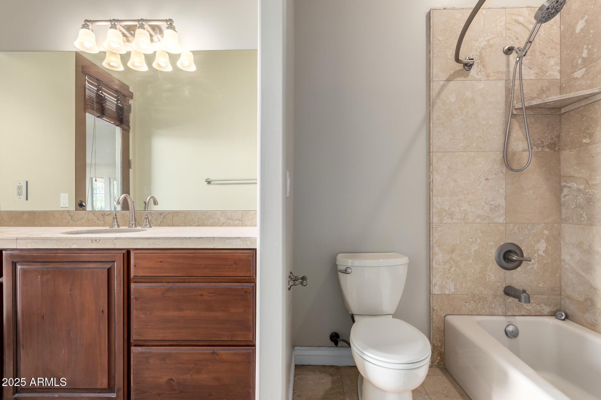 16738 East Lone Mountain Road Scottsdale, AZ 85262 - Photo 51 of 88 a bathroom with a granite countertop toilet a sink and a bathtub