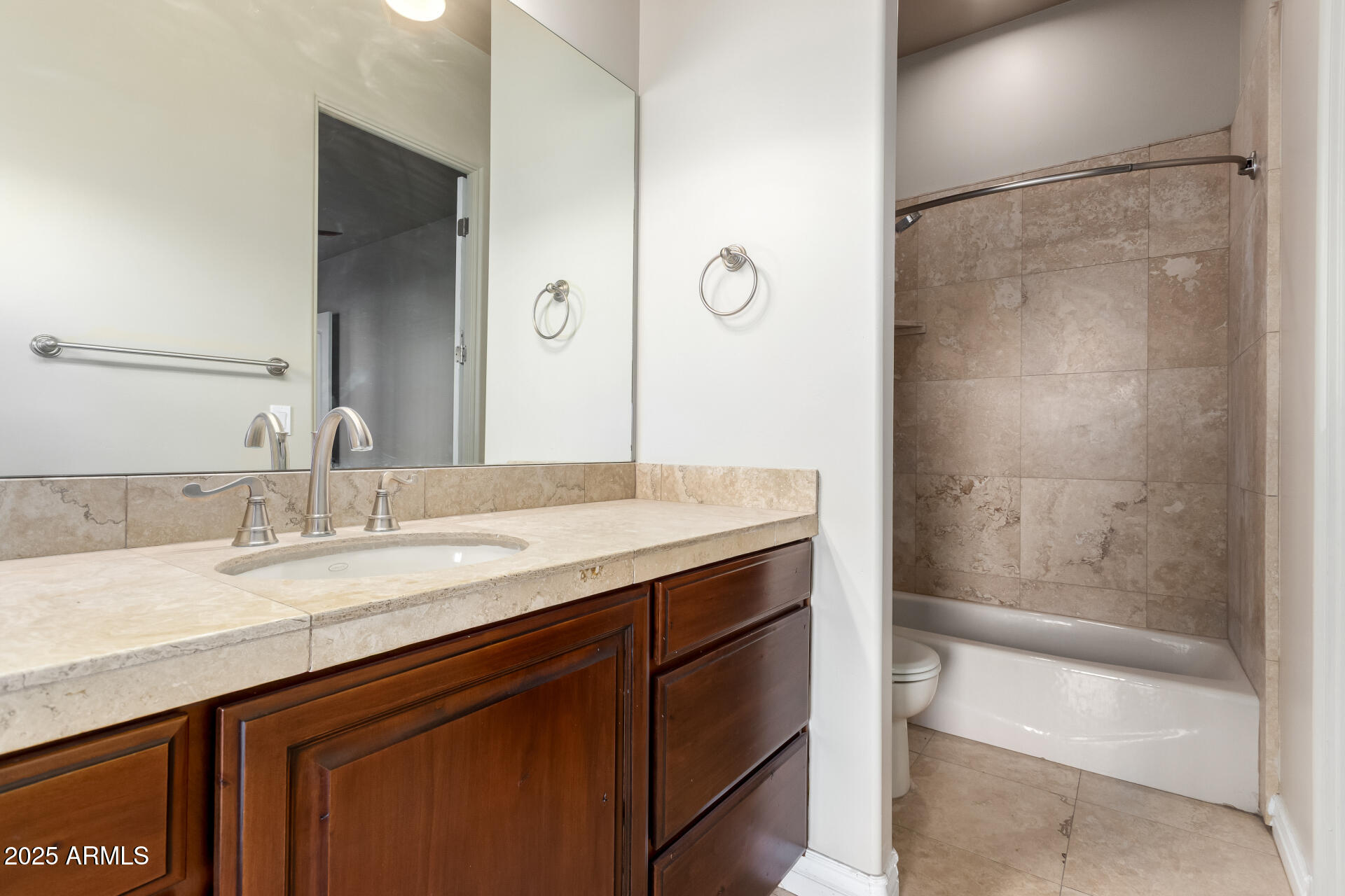 16738 East Lone Mountain Road Scottsdale, AZ 85262 - Photo 53 of 88 a bathroom with a granite countertop sink mirror and a bathtub