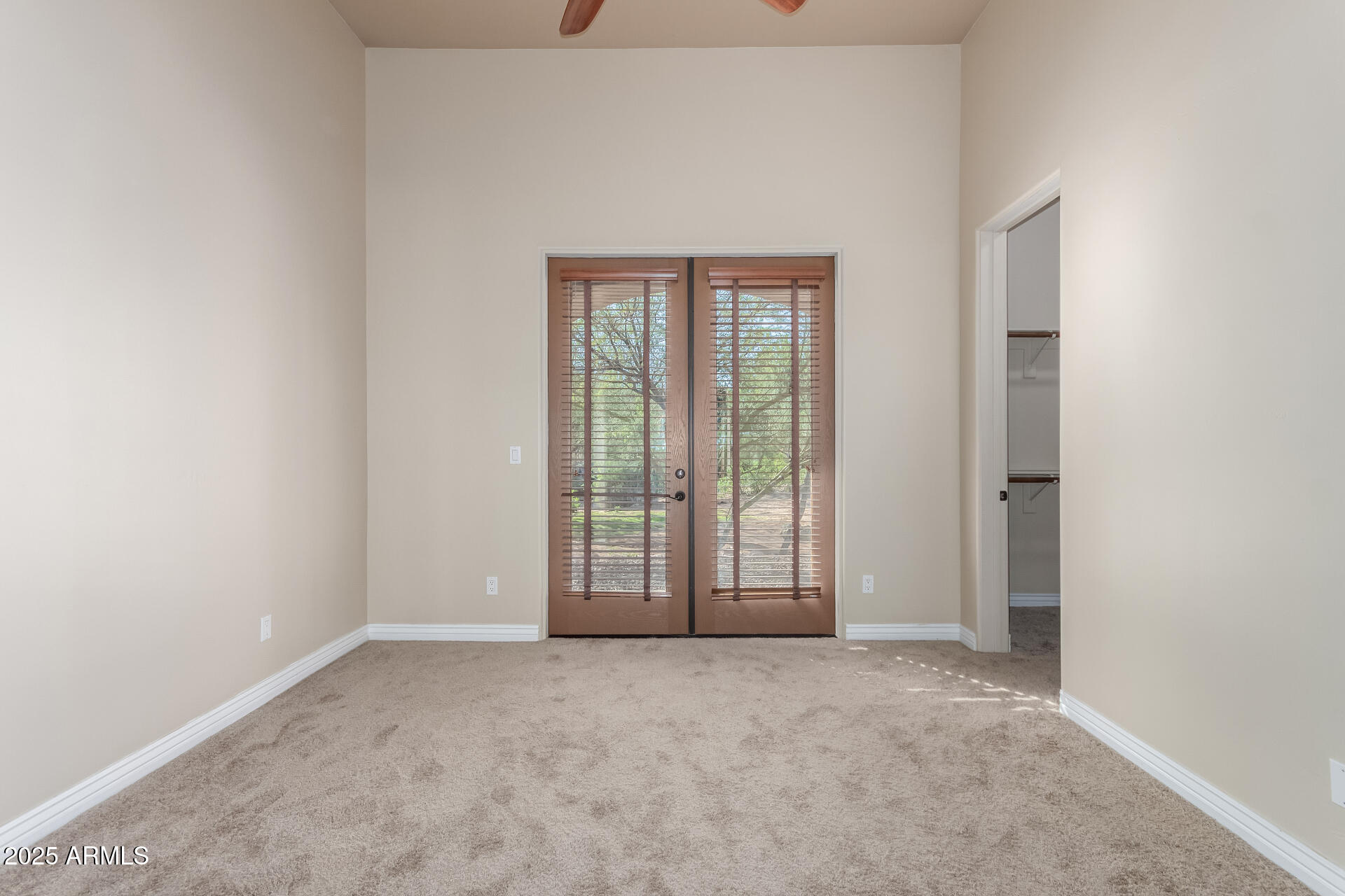 16738 East Lone Mountain Road Scottsdale, AZ 85262 - Photo 58 of 88 a view of an empty room with a window