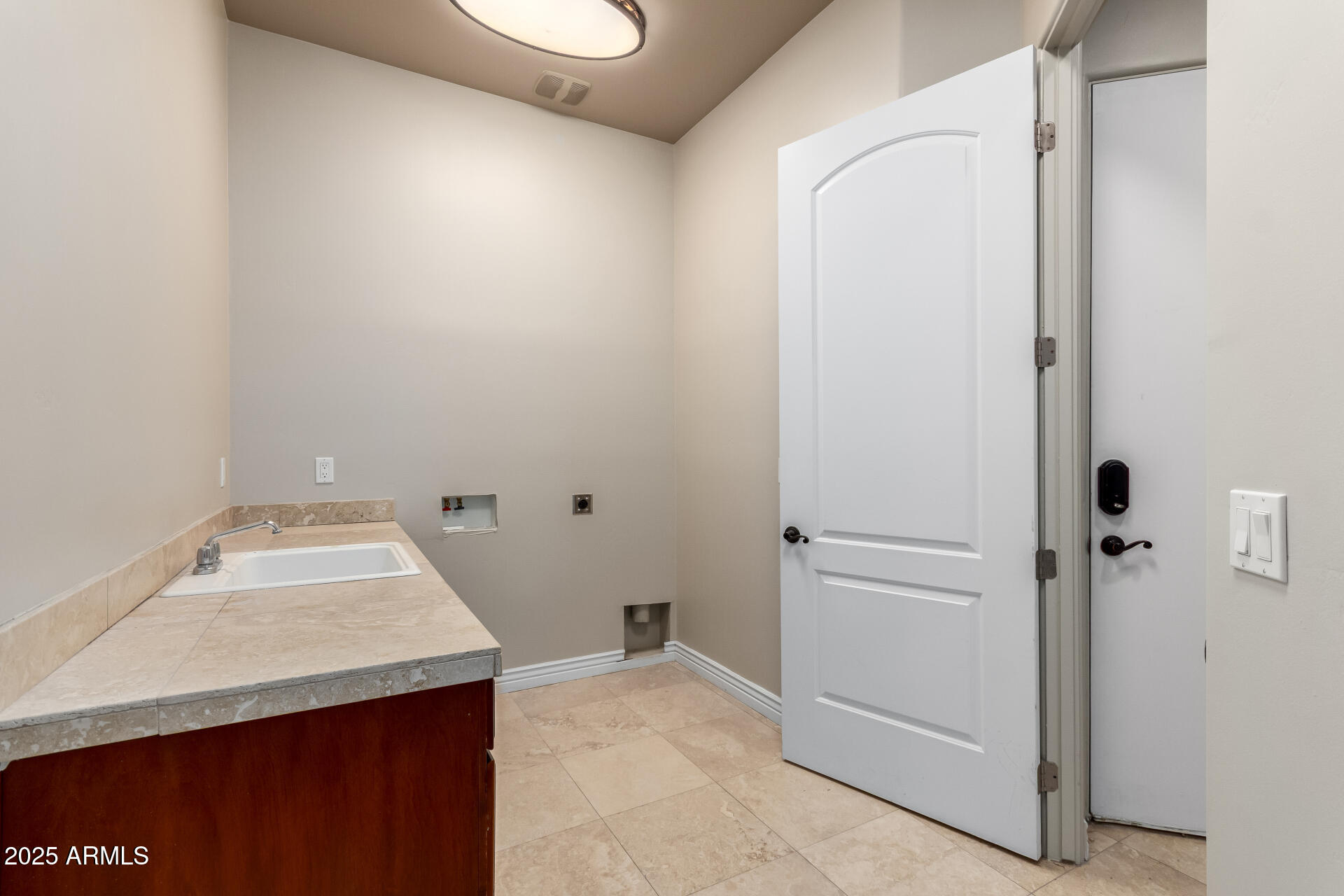 16738 East Lone Mountain Road Scottsdale, AZ 85262 - Photo 68 of 88 a bathroom with a sink and a mirror