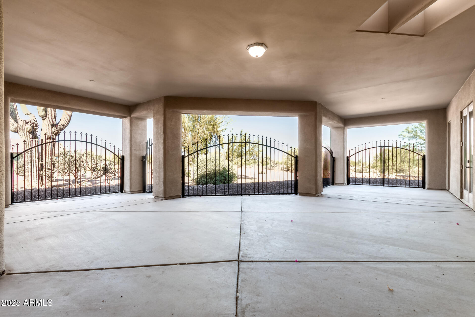 16738 East Lone Mountain Road Scottsdale, AZ 85262 - Photo 72 of 88 a view of an entryway with a garden