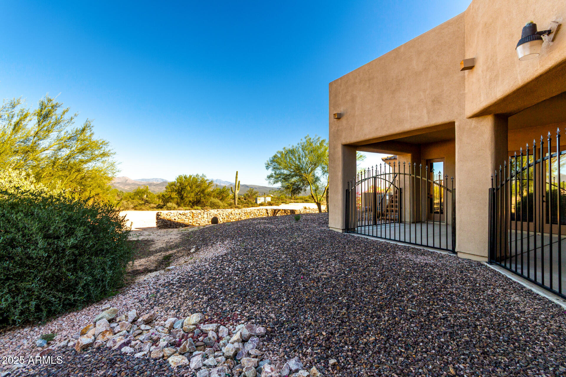 16738 East Lone Mountain Road Scottsdale, AZ 85262 - Photo 78 of 88 a view of a house with backyard and garden