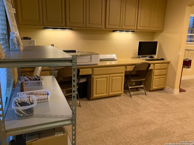 a view of a kitchen with a sink