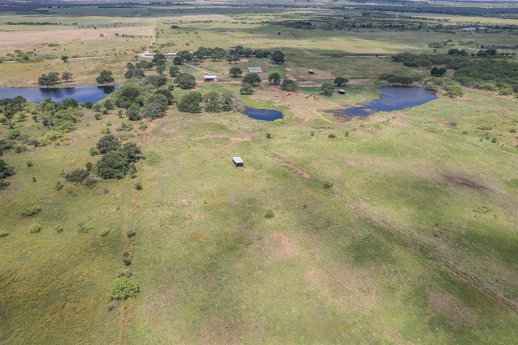 495 Lyles Road Henrietta, TX 76365 - Photo 2 of 18 Drone / aerial view with a rural view and a water view