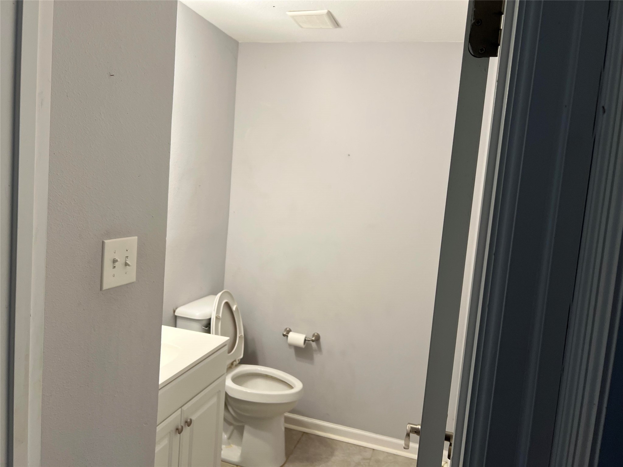 239 Old Firetower Road Bastrop, TX 78602 - Photo 10 of 39 guest Bathroom in hall for share with vanity and light tile patterned floors