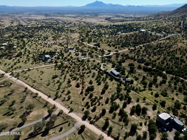 an aerial view of a city and mountain view
