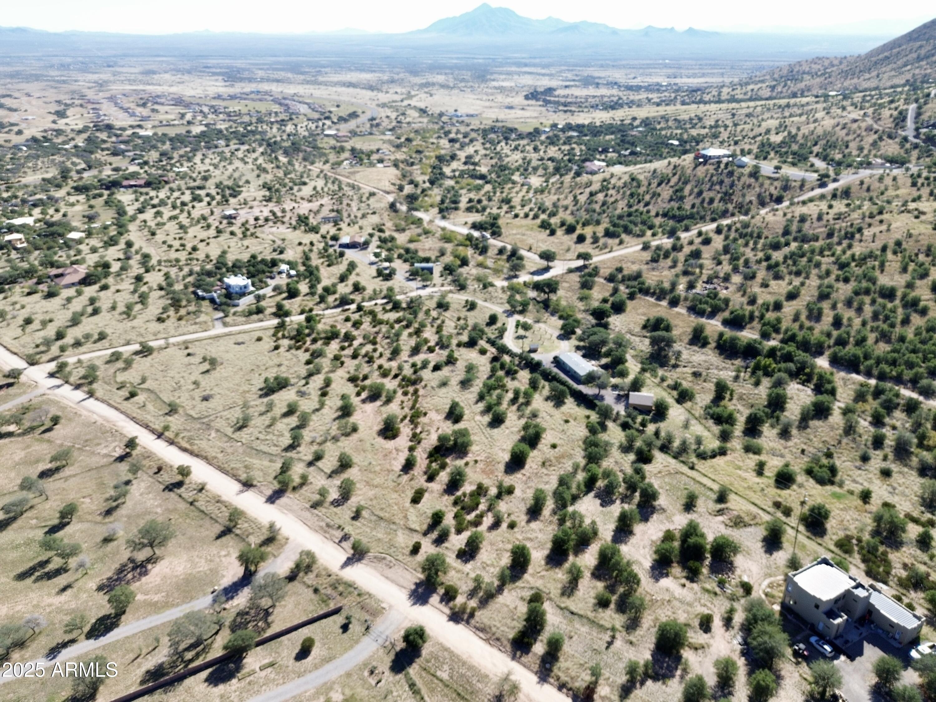5358 East Ash Canyon Road Hereford, AZ 85615 - Photo 2 of 24 an aerial view of house with yard and mountain view in back