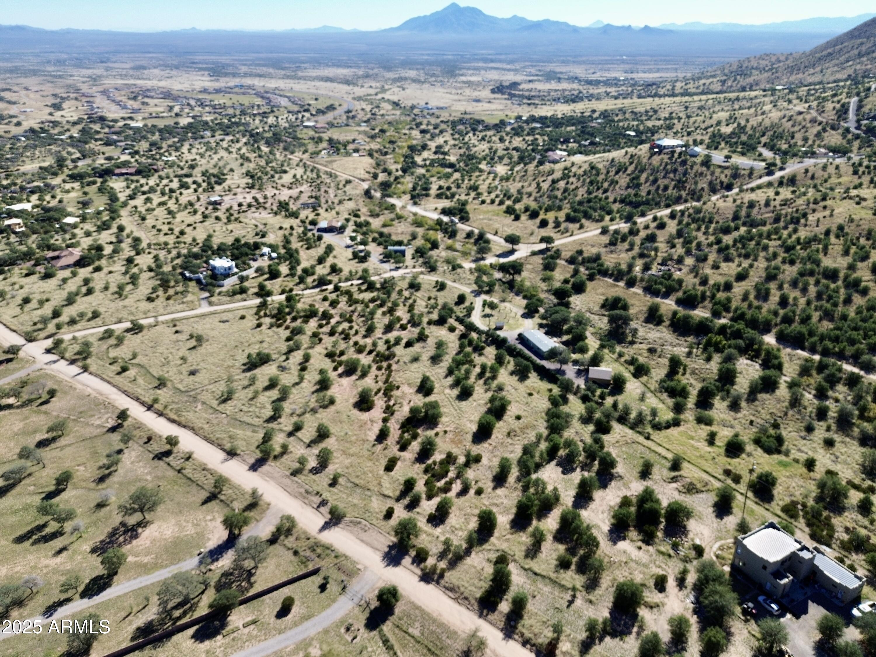 5358 East Ash Canyon Road Hereford, AZ 85615 - Photo 3 of 24 an aerial view of a house with a yard and mountain view in back