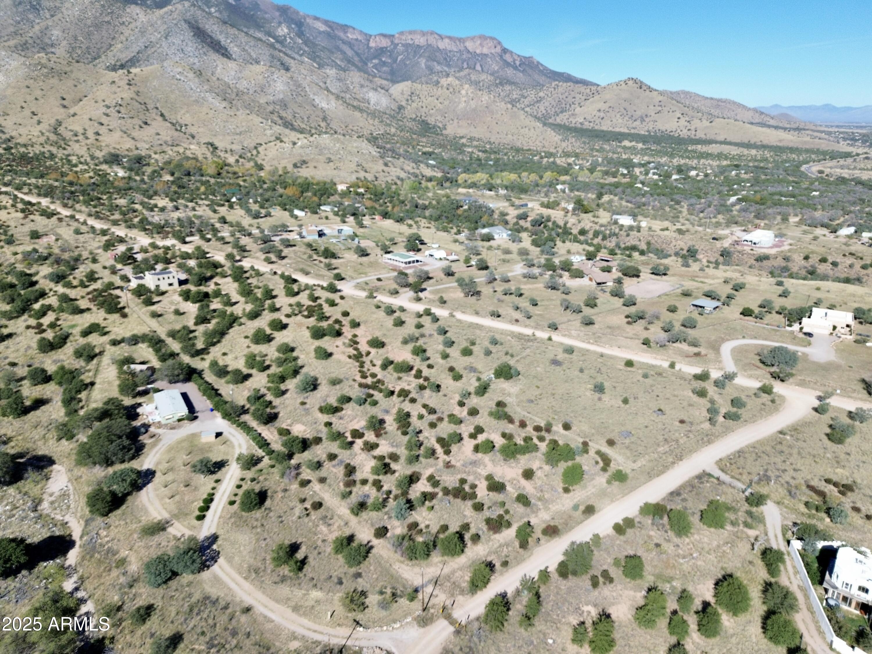 5358 East Ash Canyon Road Hereford, AZ 85615 - Photo 5 of 24 a view of a field with mountains in the background
