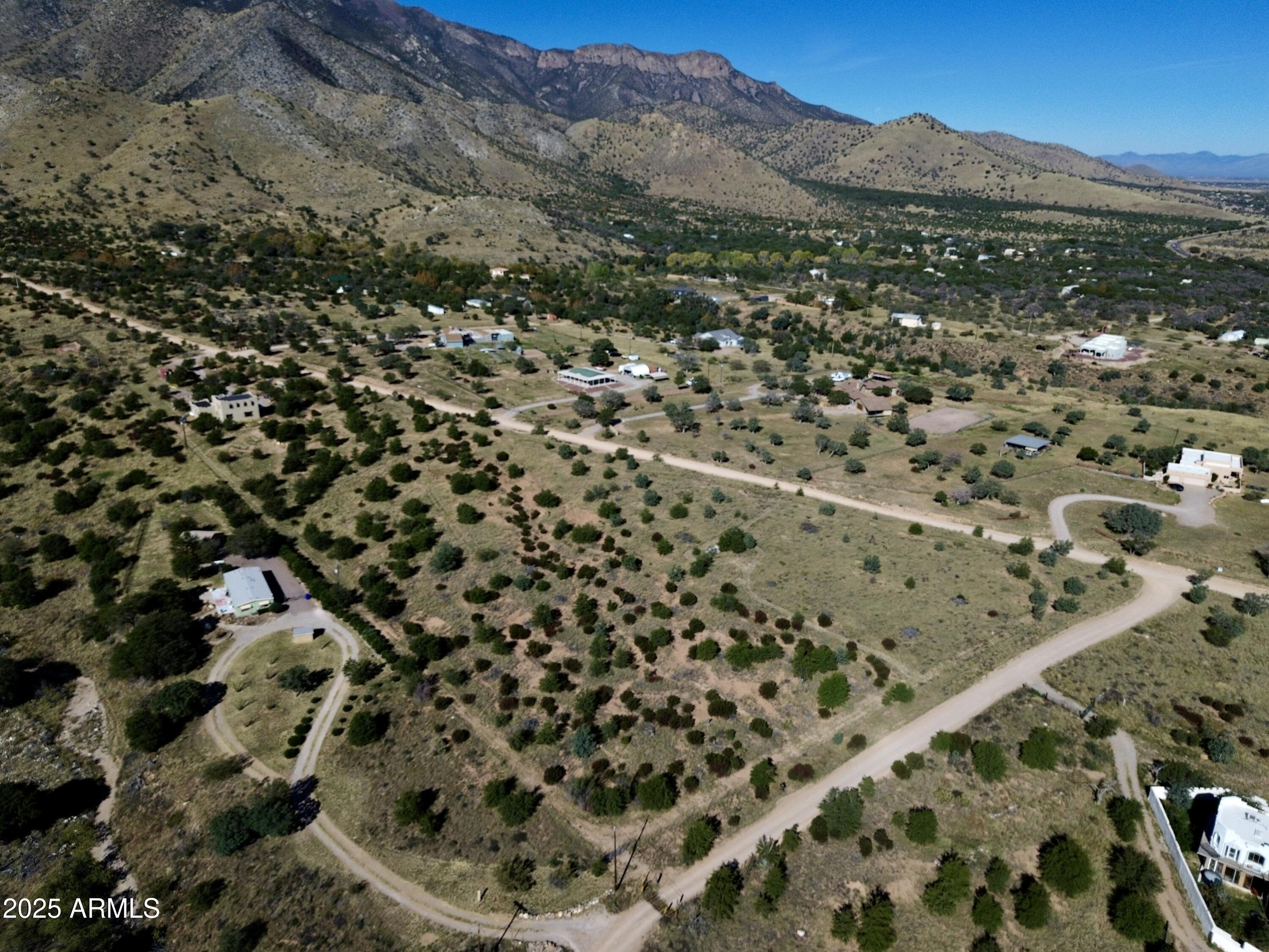 5358 East Ash Canyon Road Hereford, AZ 85615 - Photo 8 of 24 a view of a field with a mountain in the background