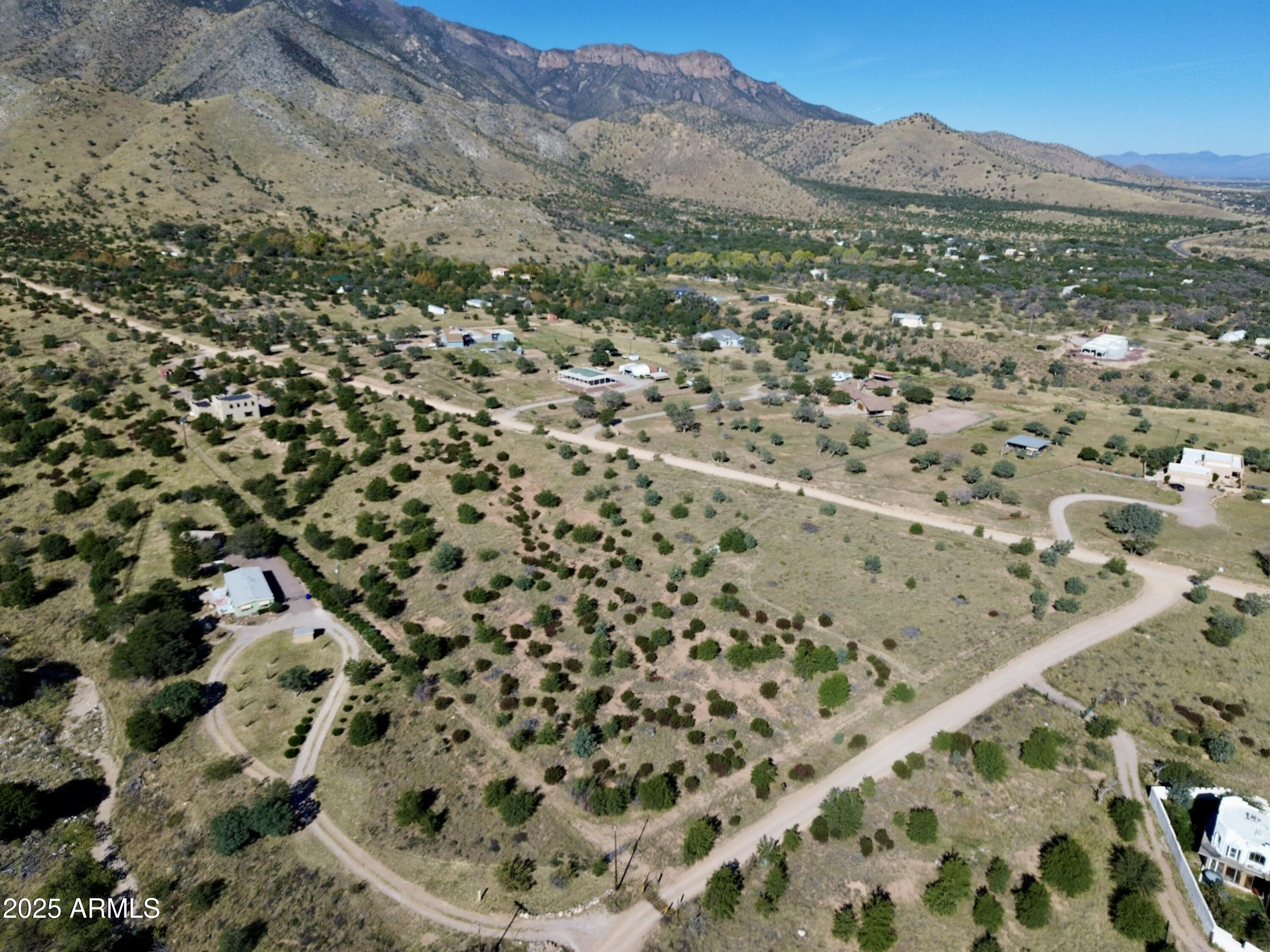 5358 East Ash Canyon Road Hereford, AZ 85615 - Photo 9 of 24 a view of a field with a mountain in the background