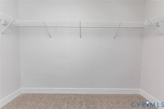 a white bath tub sitting next to a window