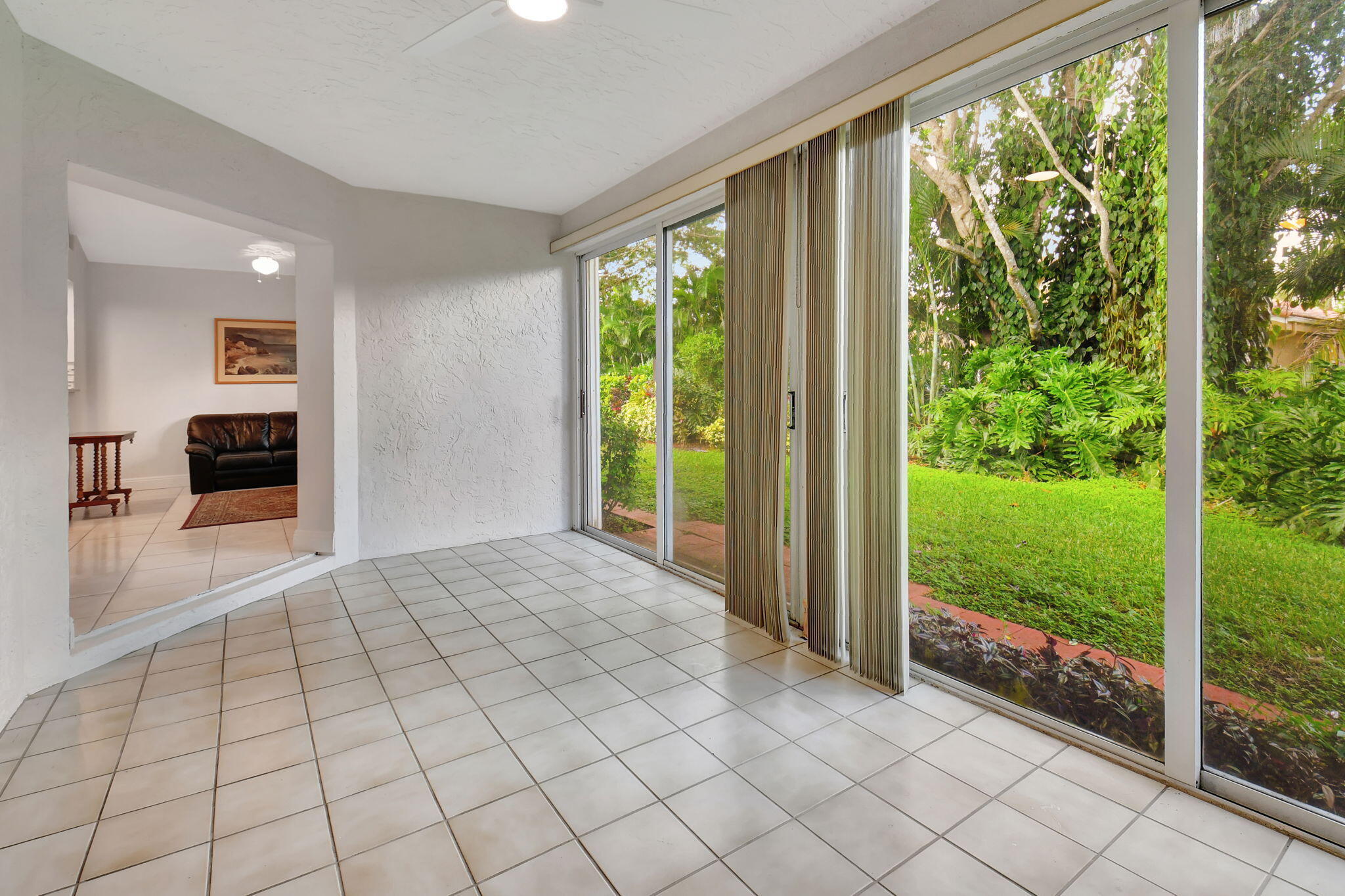 11161 Sangria Court Boca Raton, FL 33498 - Photo 16 of 26 Florida Room Into Family Room