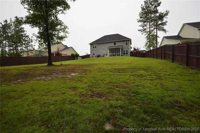 a house view with garden space