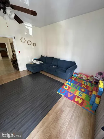 a view of a house with outdoor seating space