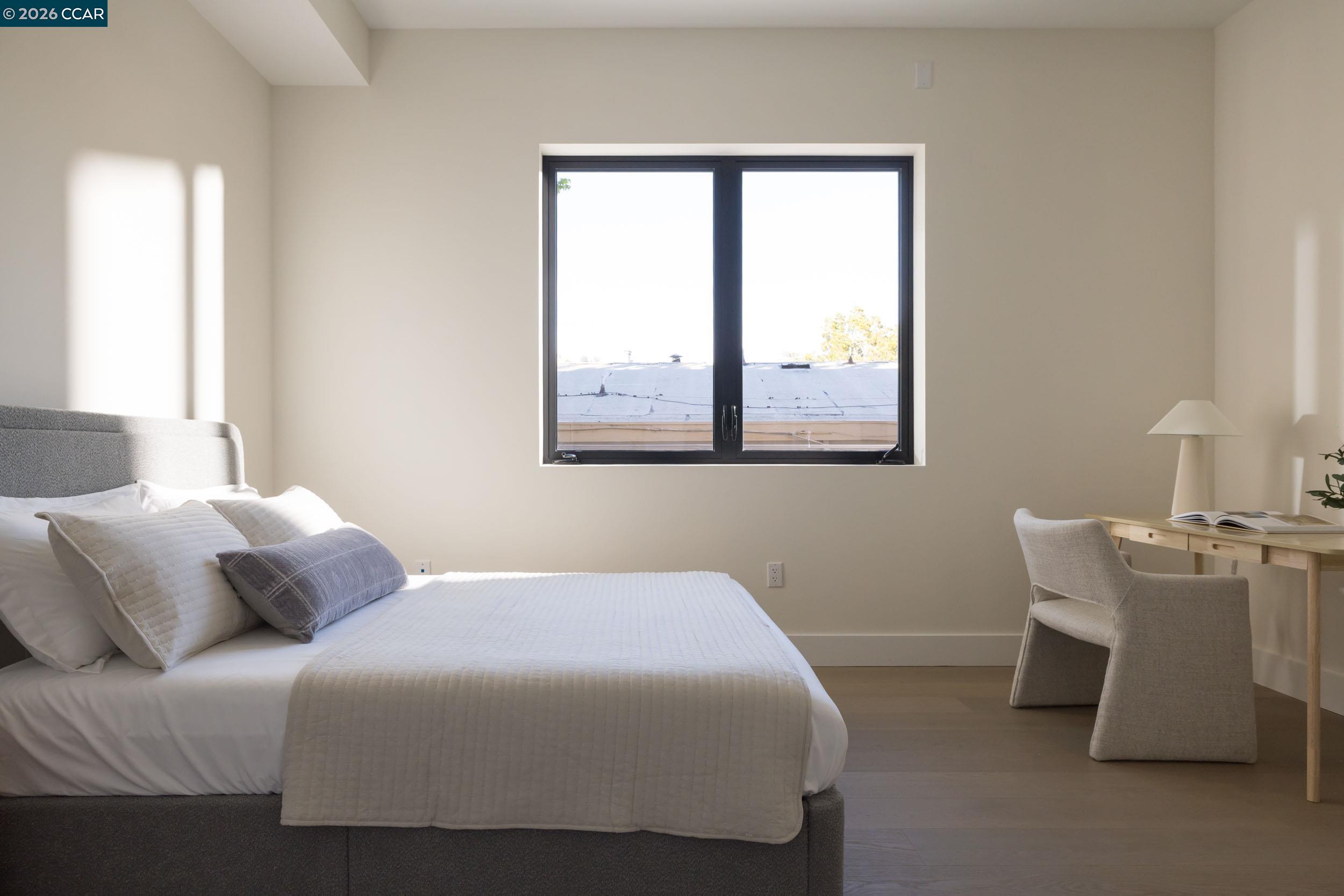 950 Hough Avenue, Unit 202 Lafayette, CA 94549 - Photo 21 of 38 a bedroom with a bed and window