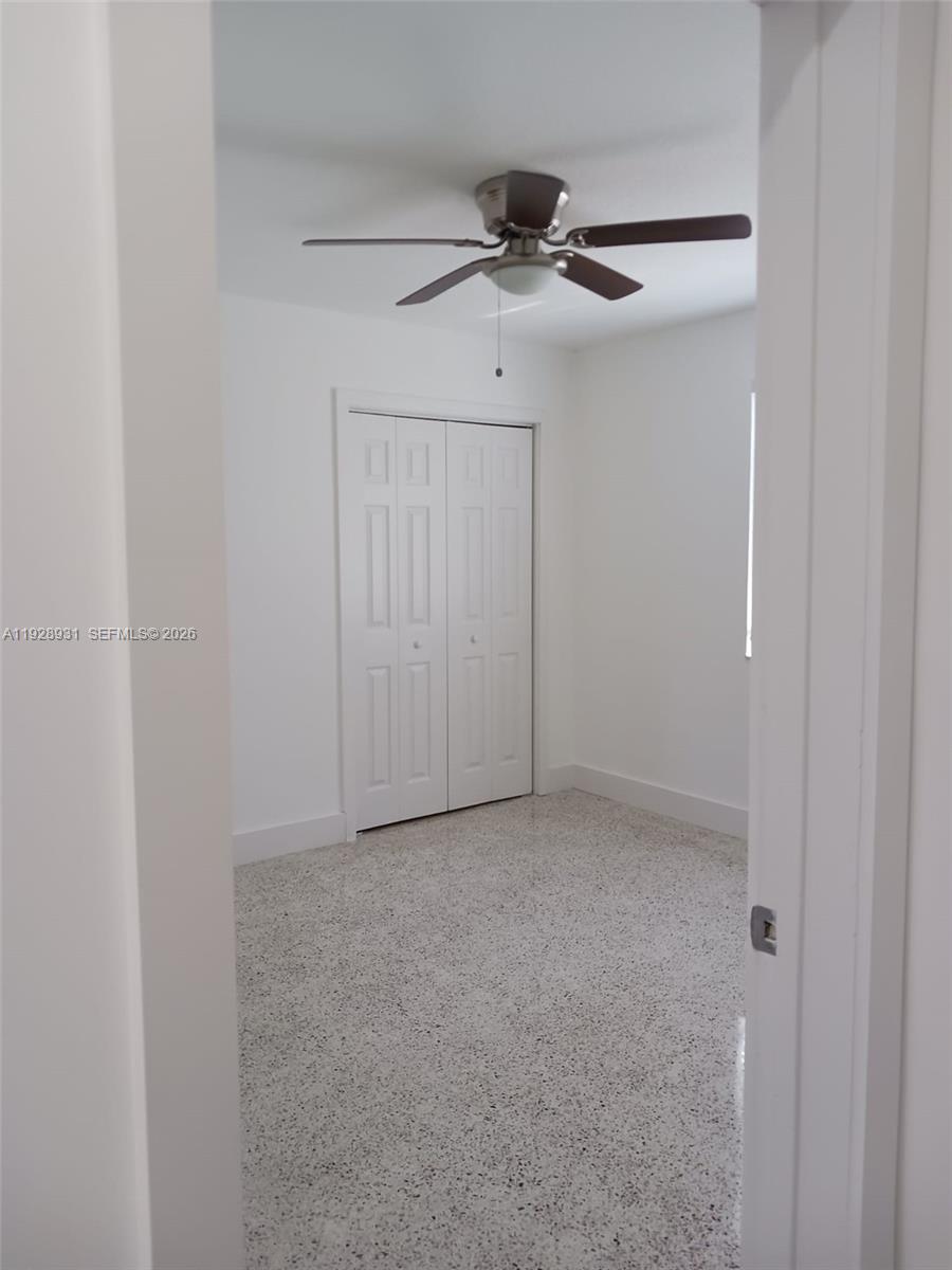 9228 Southwest 37th Street, Unit 9228 Miami, FL 33165 - Photo 13 of 25 a view of an empty room