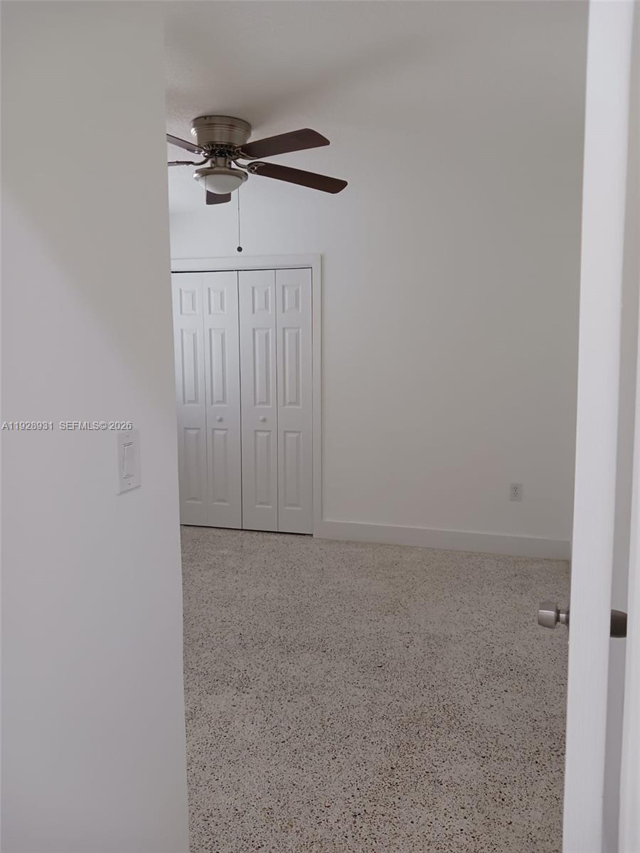 9228 Southwest 37th Street, Unit 9228 Miami, FL 33165 - Photo 15 of 25 a view of a hallway