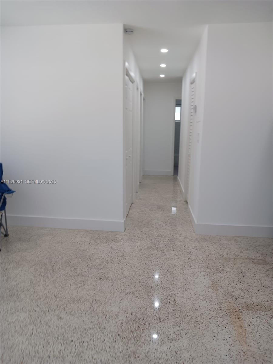 9228 Southwest 37th Street, Unit 9228 Miami, FL 33165 - Photo 19 of 25 a view of an empty room