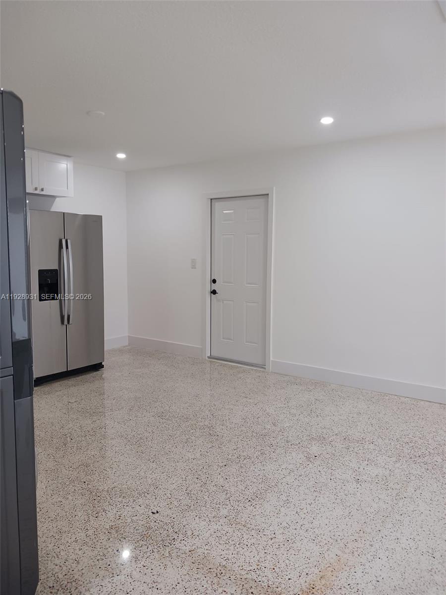 9228 Southwest 37th Street, Unit 9228 Miami, FL 33165 - Photo 9 of 25 a view of an empty room