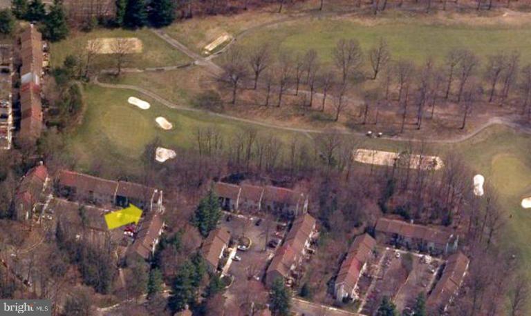2023 Sarazen Place Reston, VA 20191 - Photo 2 of 30 a aerial view of house with yard and swimming pool
