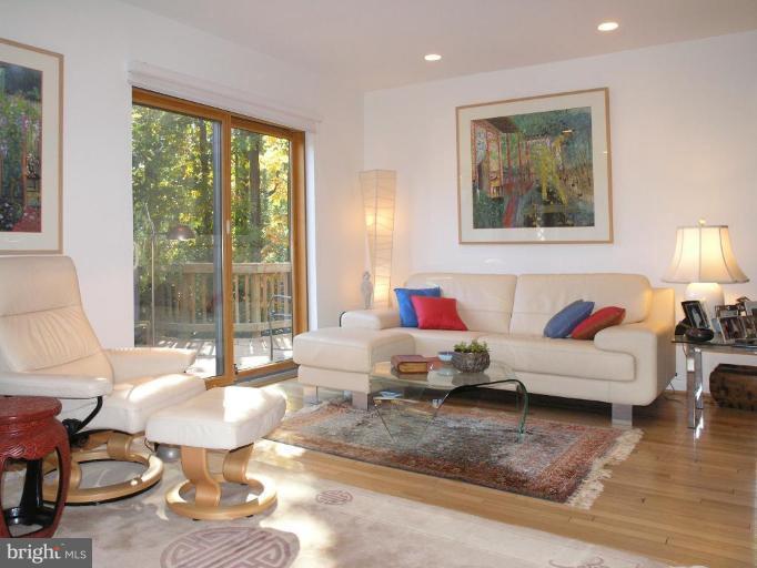 2023 Sarazen Place Reston, VA 20191 - Photo 3 of 30 a living room with furniture and a large window