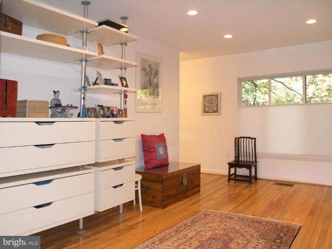 2023 Sarazen Place Reston, VA 20191 - Photo 24 of 30 a room with furniture and view of kitchen