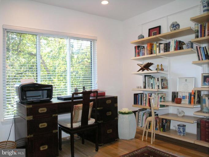 2023 Sarazen Place Reston, VA 20191 - Photo 25 of 30 a view of a workspace with furniture and a window