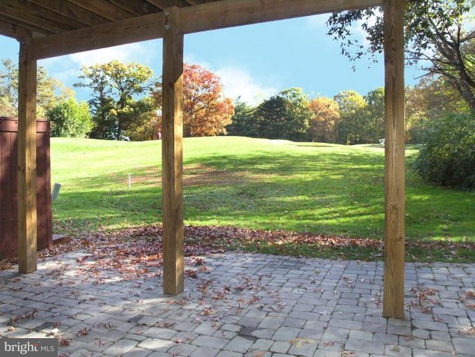 2023 Sarazen Place Reston, VA 20191 - Photo 27 of 30 a view of a garden with a tree