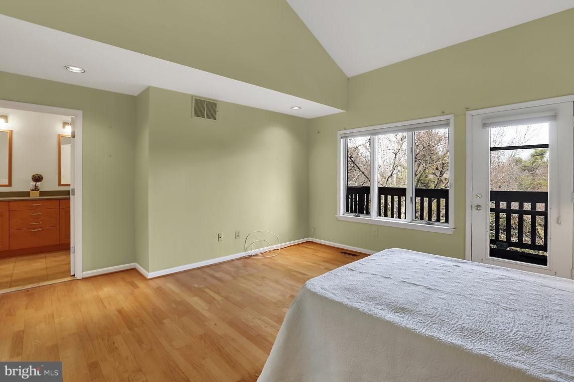 5711 Visitation Way Baltimore, MD 21210 - Photo 14 of 25 a bedroom with bed and window